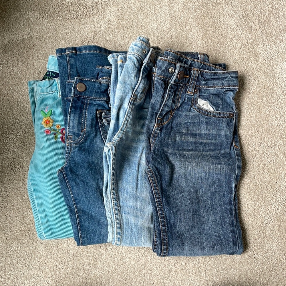 Group of boot at jeans and corduroys.